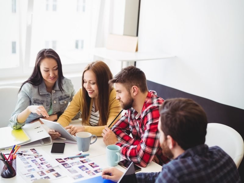 photo-editors-with-digital-tablet-in-meeting-room.jpg photo-editors-with-digital-tablet-in-meeting-room.jpg